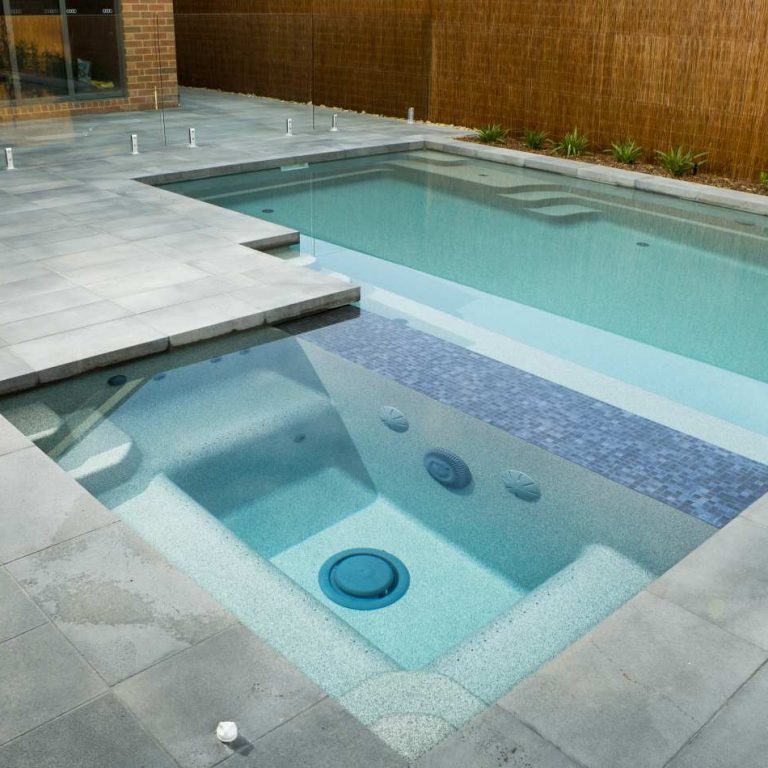 Pool and spa combo with Compass pool and spa