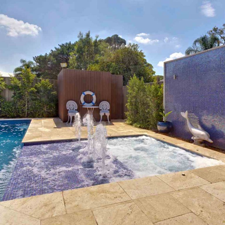 Sunpod water feature connecting a spa to the pool